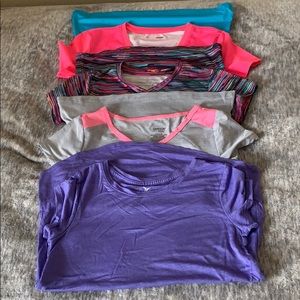 4 pack of active wear shirts for girls.
